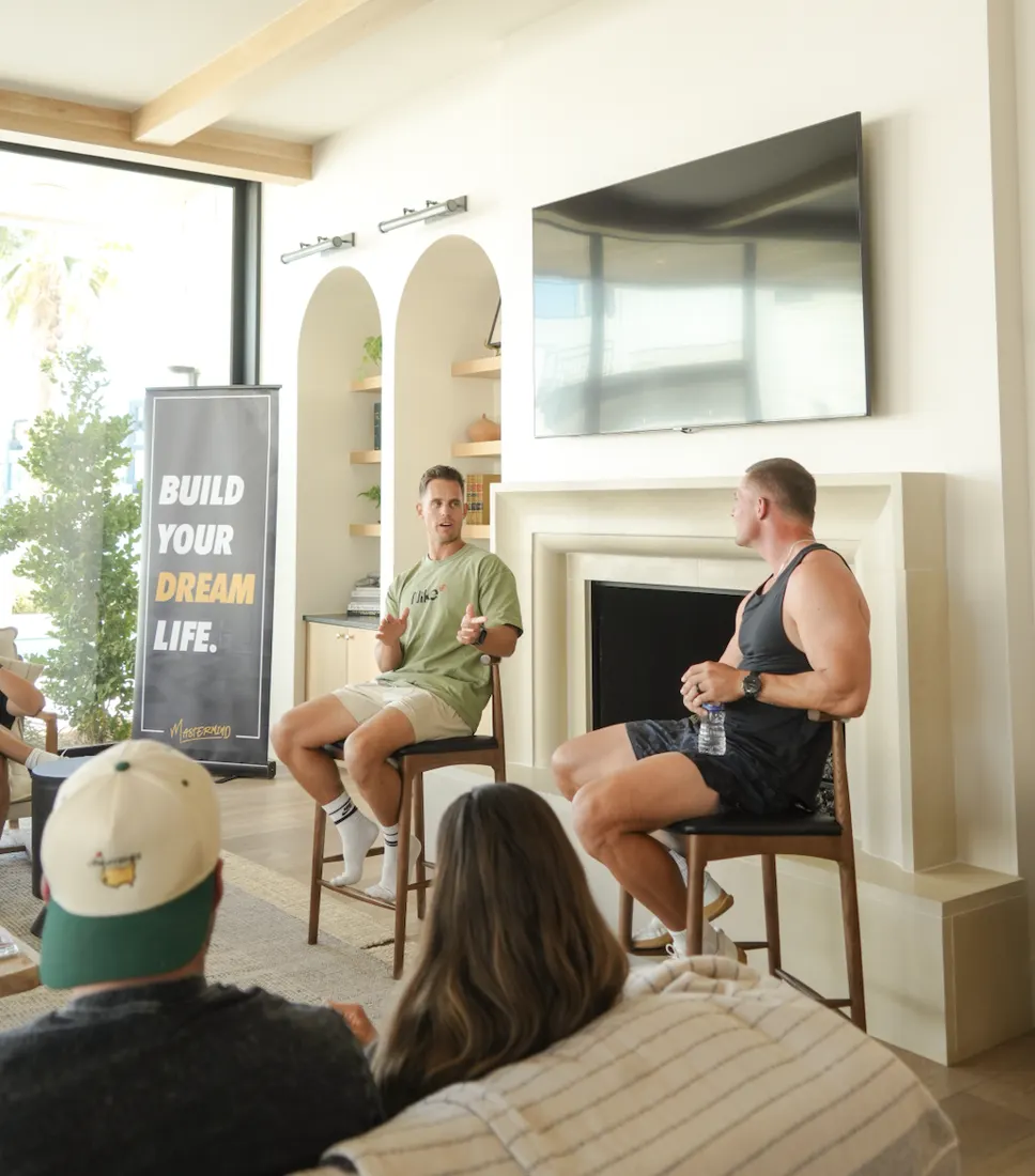 Fireside session at a DBF event under the Build Your Dream Life banner